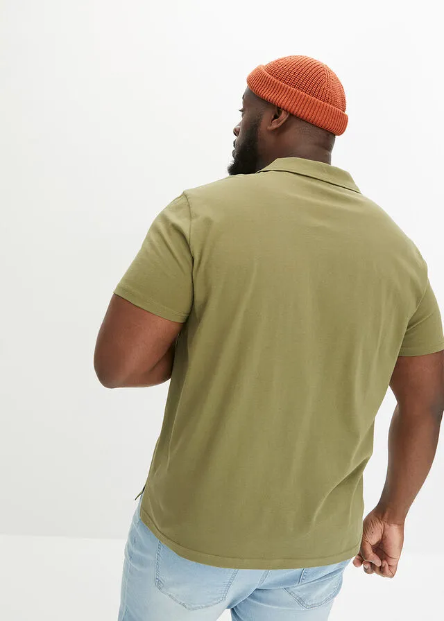 Olive green polo shirt.